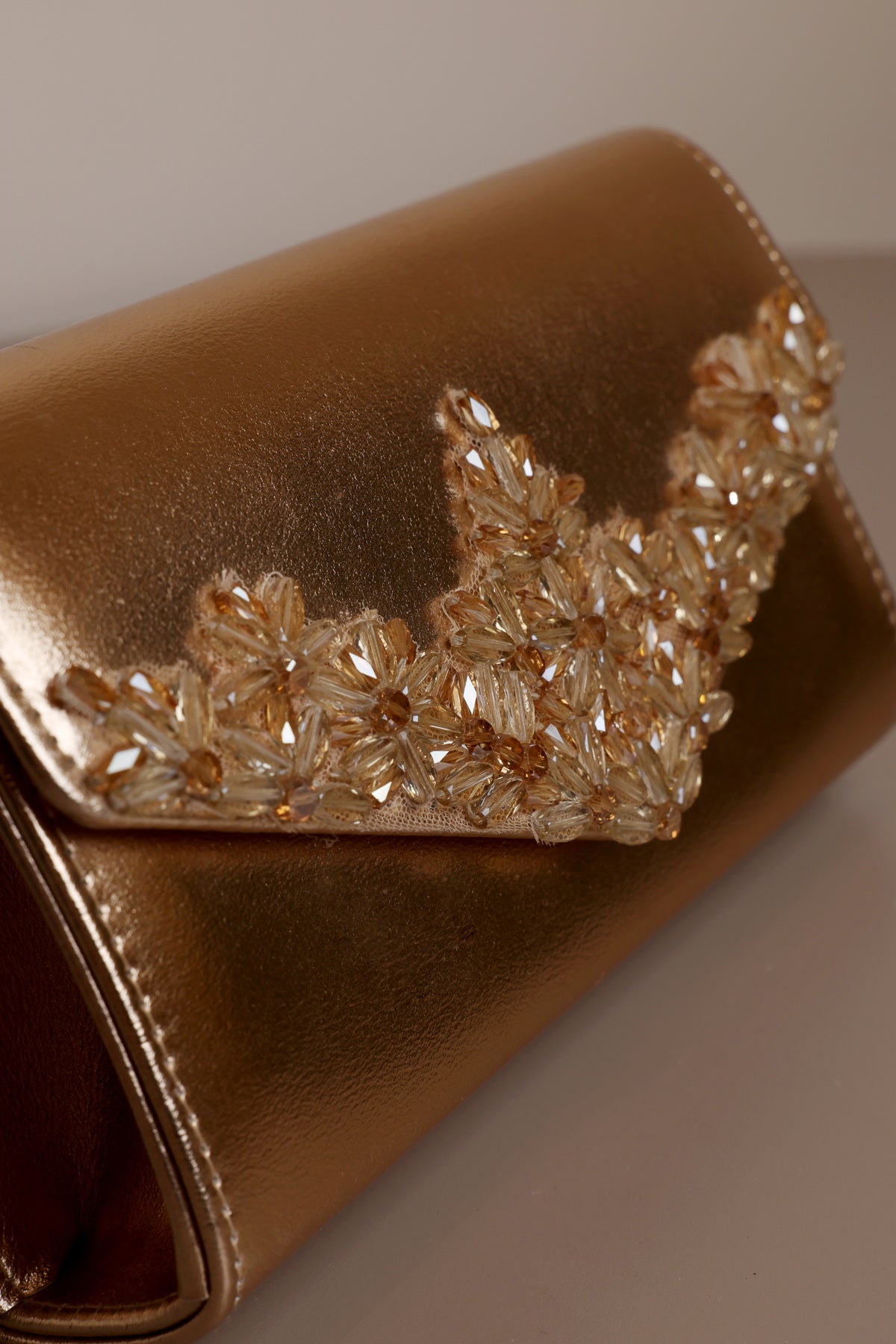 Gold Embellished Leather Clutch