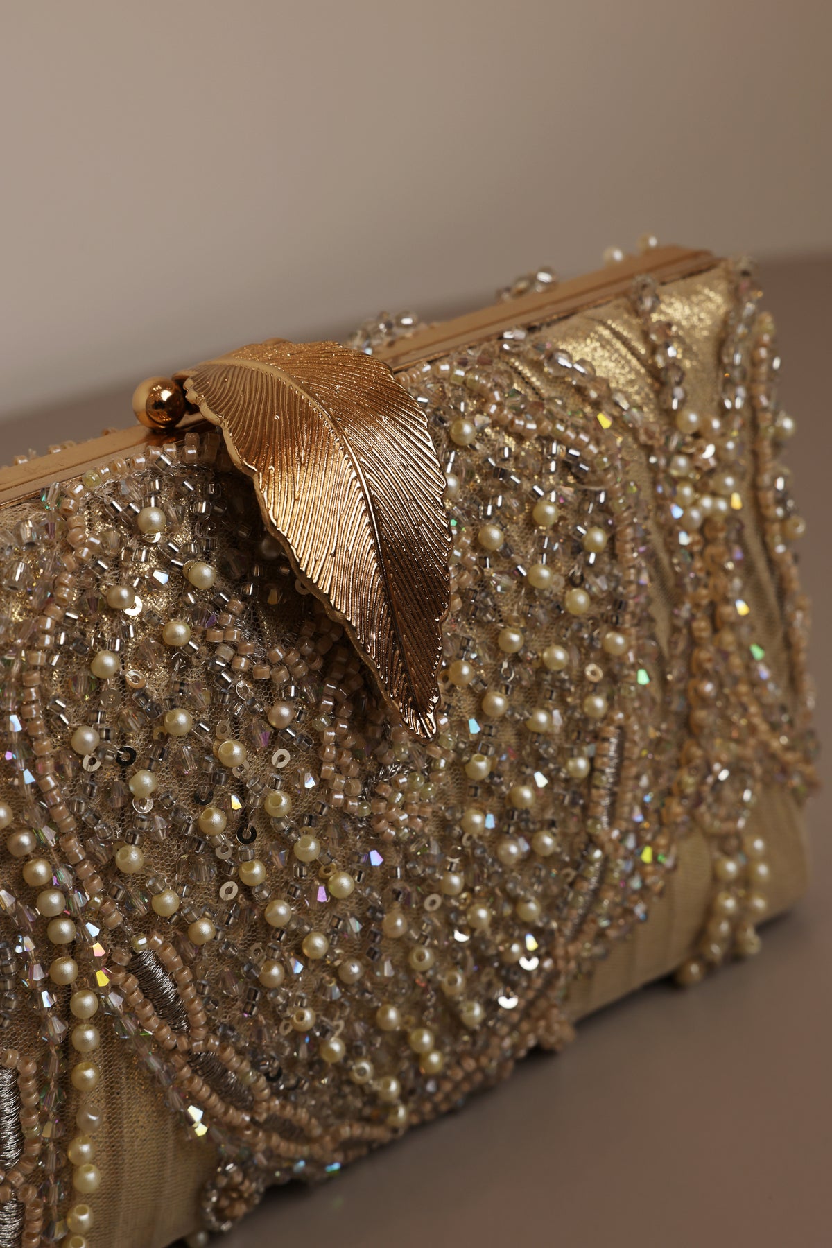Gold Clutch with Accent Leaf Closure